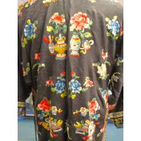 China: Embroidered silk tunic.