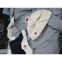 US: WWII Red Cross nurses uniform with cap and snood.