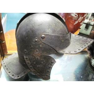 US: 1600s Lobter tail helmet.